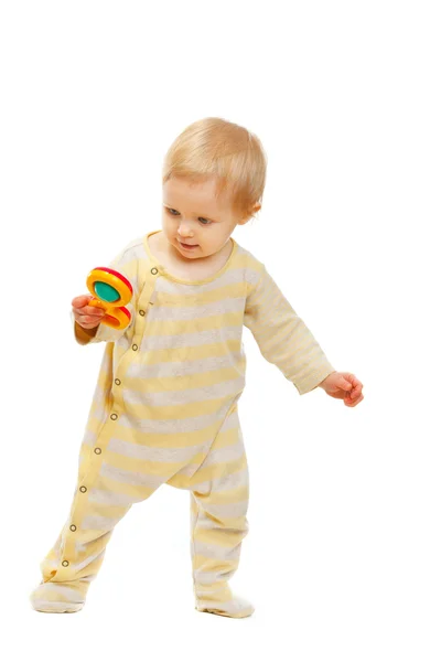 Niedliches Baby mit Rassel auf weißem Hintergrund — Stockfoto