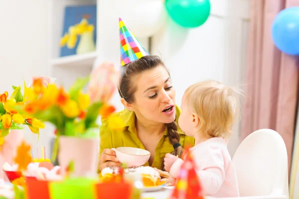 Mother celebrating first birthday of her baby — Stock Photo, Image