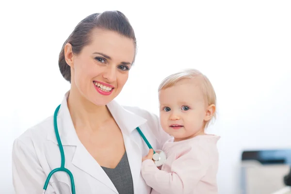Portrait of pediatric doctor with kid Stock Picture