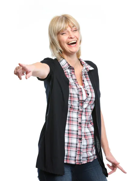 Sorrindo mulher de meia idade apontando para você — Fotografia de Stock