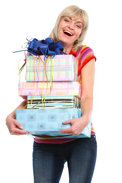 Happy elderly woman with stack of present boxes — Stock Photo, Image