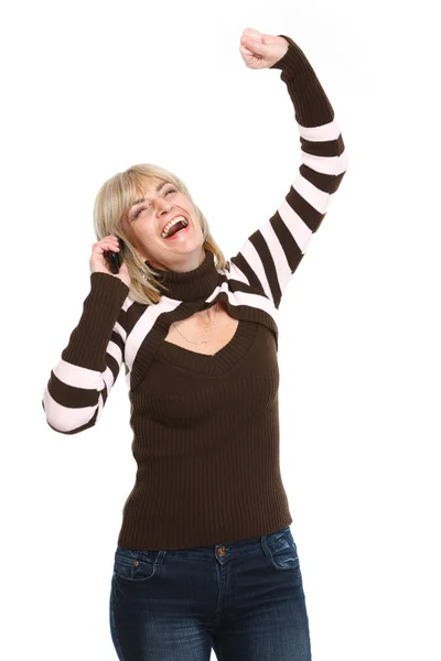 Szczęśliwy średnim wieku kobieta rozmawia przez telefon i powodzenie radość — Zdjęcie stockowe
