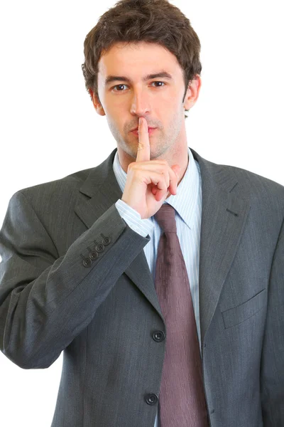 Portrait of modern business man showing shh gesture — Stock Photo, Image