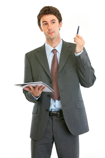 Homem de negócios moderno com bloco de notas e caneta tem ideia — Fotografia de Stock