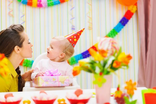 Mother giving birthday present for baby — Stock Photo, Image