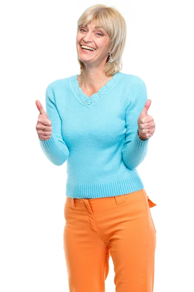 Middle age woman showing thumbs up Stock Picture