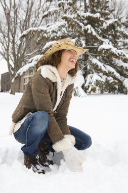 Woman squatting. clipart