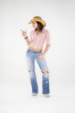 Cowgirl with imaginary gun. clipart