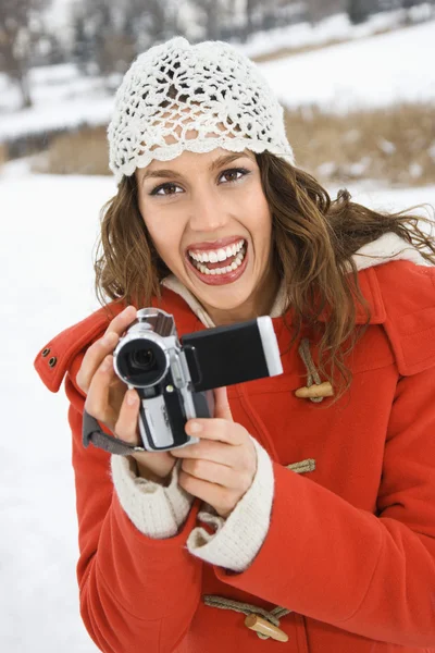 Woman and video camera. — Stock Photo, Image