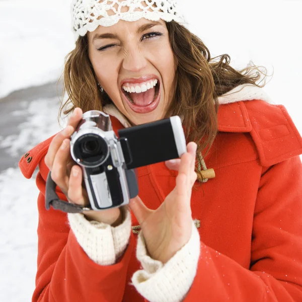 Woman with video camera. — Stock Photo, Image