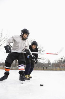 Ice hockey players. clipart