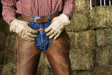 Man in Front of Hay Bales clipart