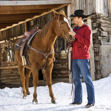 man met paard.