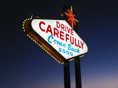 Leaving Las Vegas Sign at Night clipart