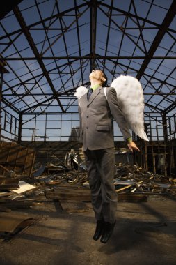 Young Businessman With Angel Wings clipart