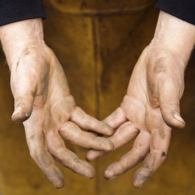 Metalsmith's hands. clipart