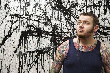 Man with tattoos. clipart