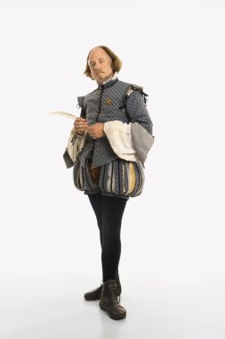 Shakespeare standing with quill. clipart
