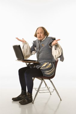 Shakespeare with laptop. clipart