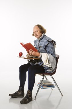 Shakespeare in school desk. clipart