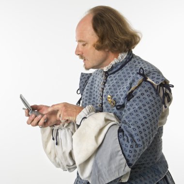 Shakespeare using cell phone. clipart