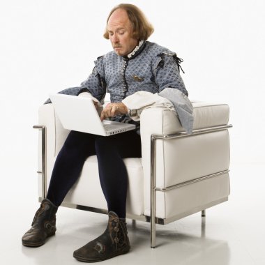 Shakespeare on laptop computer. clipart