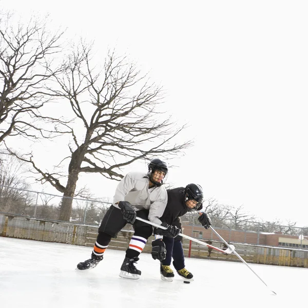 Boys playing winter sport. — Stok fotoğraf