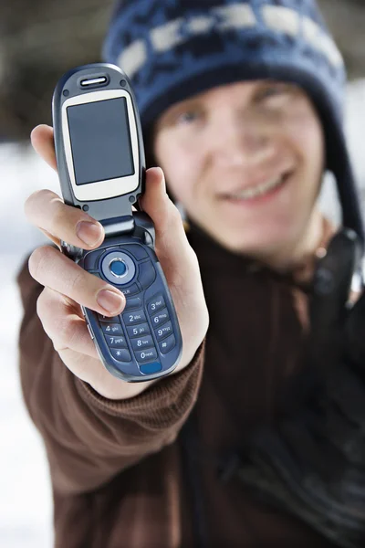 Tini gazdaság cellphone. — Stock Fotó