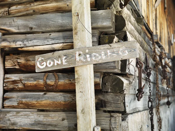 Sign and Old Stable — Stockfoto