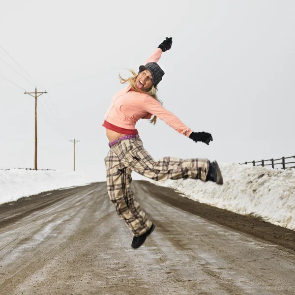 Woman jumping joyfully. — Stock Photo, Image