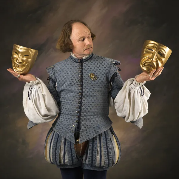 Shakespeare con máscaras teatrales . —  Fotos de Stock