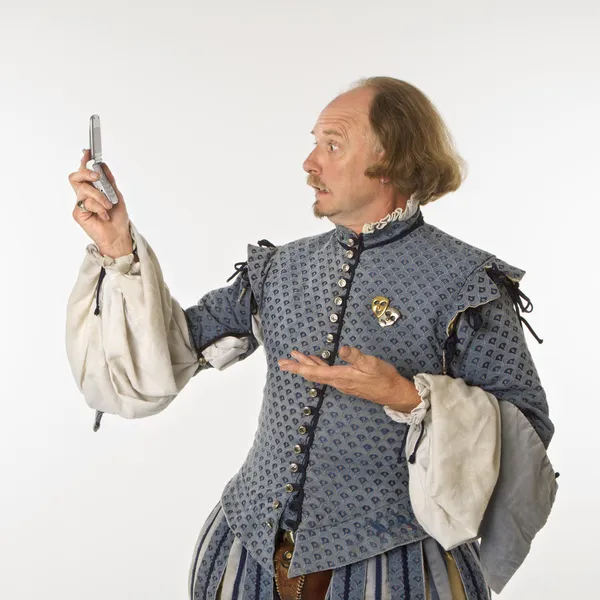Shakespeare olhando para o telefone . — Fotografia de Stock