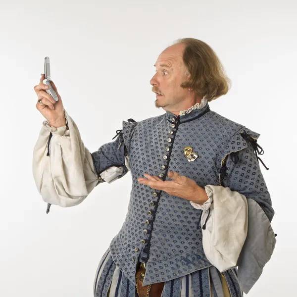 stock image Shakespeare looking at phone.