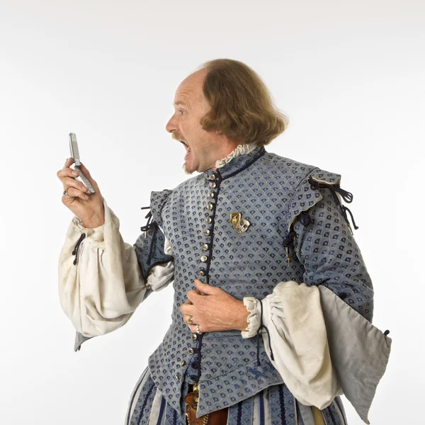 stock image Shakespeare screaming at cell phone.