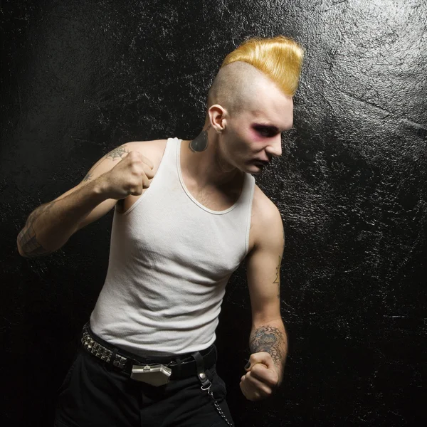 Punk with clenched fists. — Stock Photo, Image