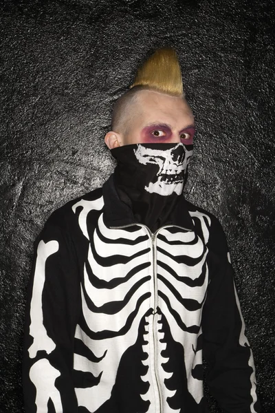 Punk with skeleton costume. — Stock Photo, Image
