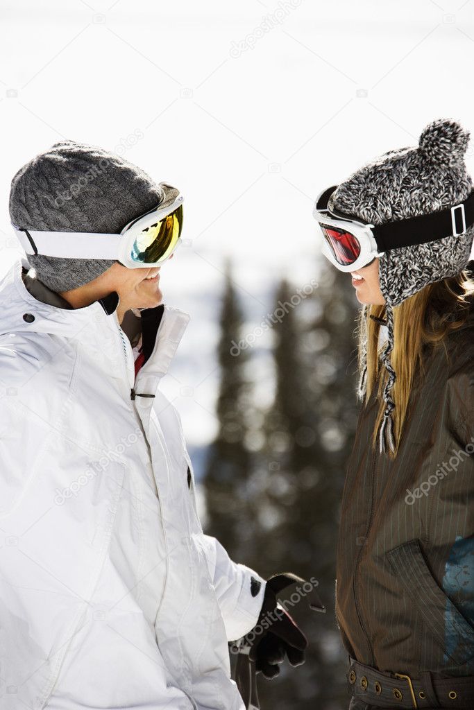 Two Skiers Smiling at Each Other