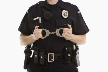 Policewoman with handcuffs. clipart