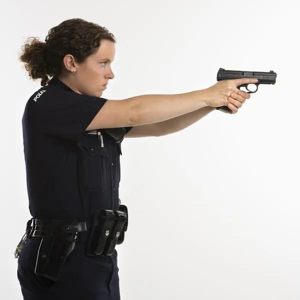 Policial apontando arma . — Fotografia de Stock