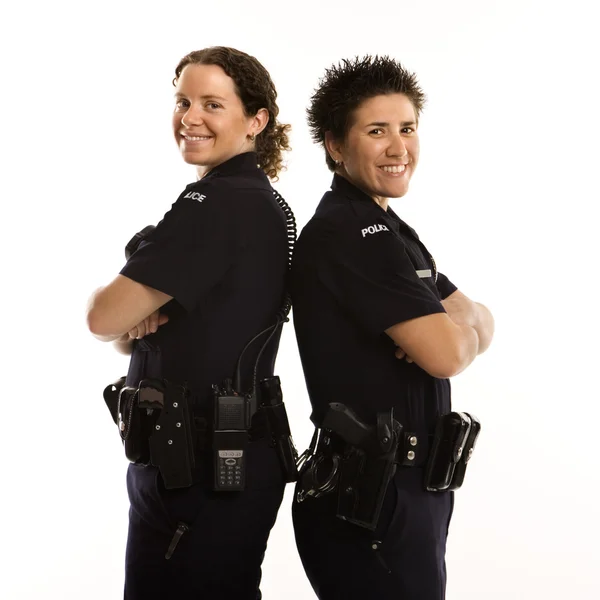 Policewomen back to back. — Stock Photo, Image