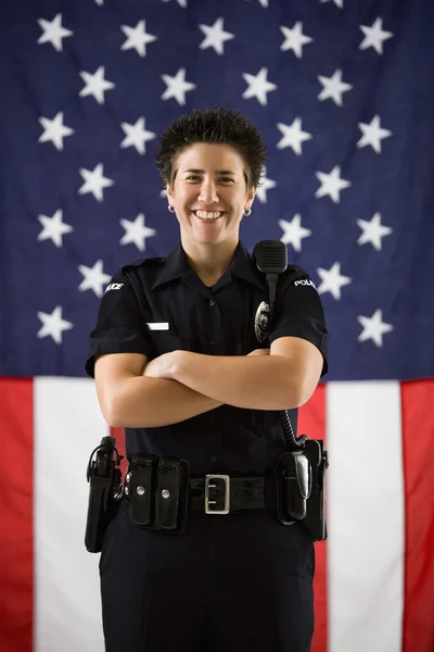 stock image Policewoman and flag.