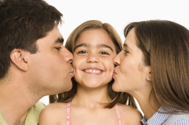 Parents kissing girl. clipart