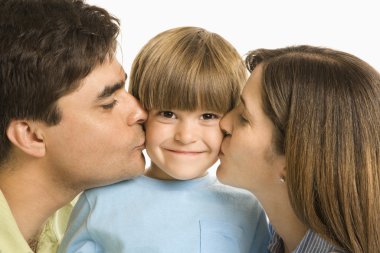 Parents kissing son. clipart