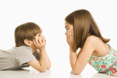 Children looking at eachother. clipart