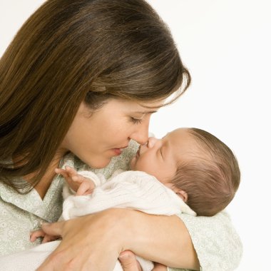 Mother holding baby. clipart