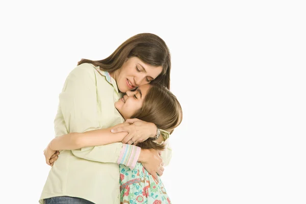 Mother and daughter hugging. — Stock Photo, Image