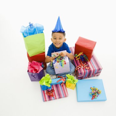 Boy with presents. clipart