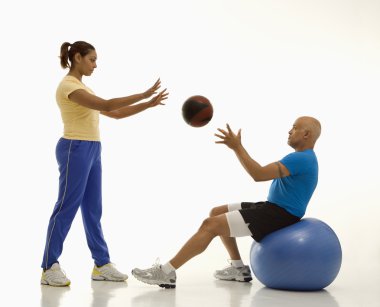 Woman and man exercising. clipart