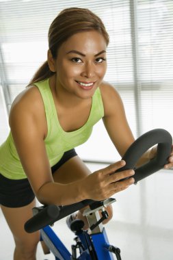 Woman exercising. clipart