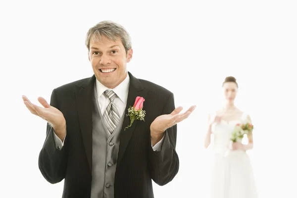 Brudgummen med händer upp. — Stockfoto